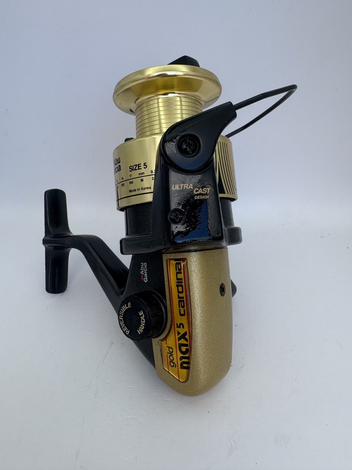 Abu Garcia Cardinal Gold Max 5, Rolle Angelzuhör1